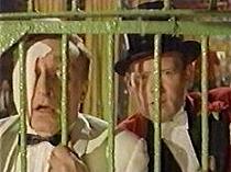 Anton Diffring and the ringmaster witness the horror!