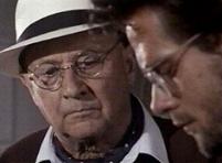 Pleasence and Michael Dudikoff go over the maps