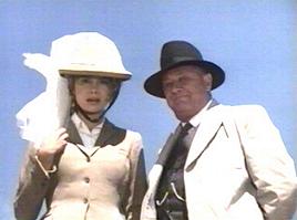 Thorp and Pleasence watch the danger that awaits below