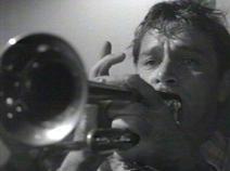 Burton playing his jazz trumpet